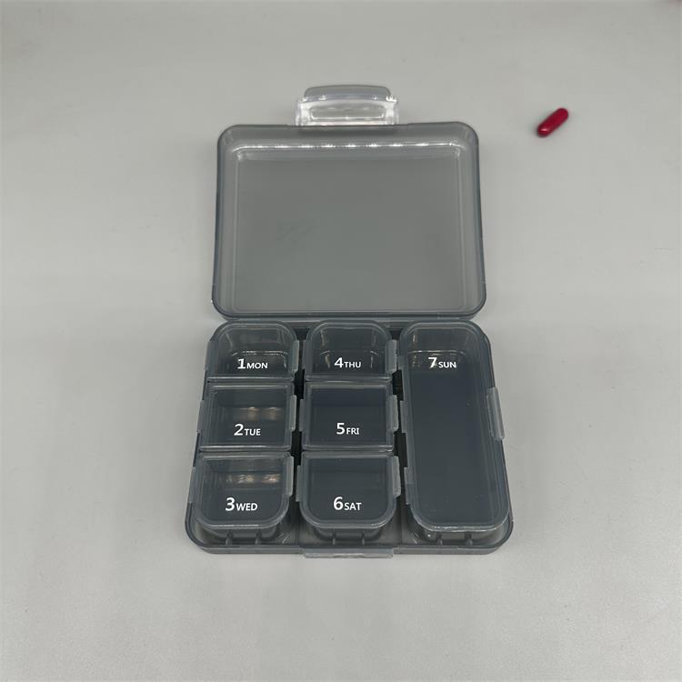 Portable 7-Compartment Pill Box